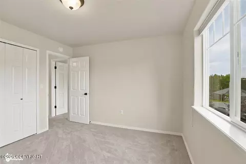 Bedroom - 17250 Hideaway Ridge Dr, Eagle River, AK 99577 photo 9 of 13