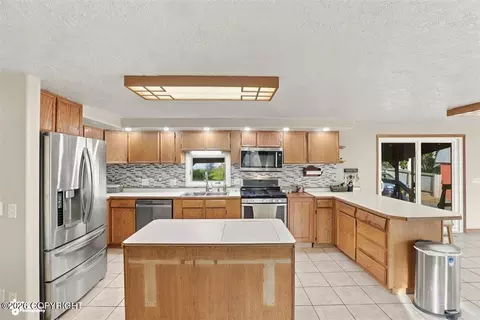 Kitchen - 10209 Colville St, Eagle River, AK 99577 photo 7 of 7