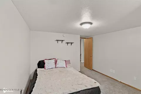 Bedroom - 10209 Colville St, Eagle River, AK 99577 photo 5 of 7