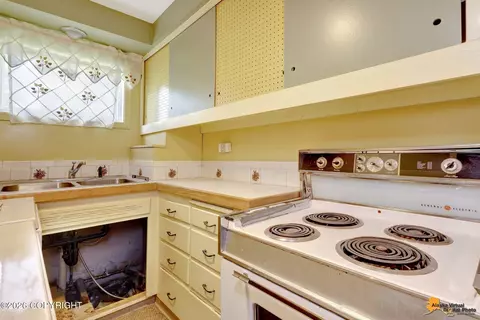Kitchen - 1306 E 26th Ave, Anchorage, AK 99508 photo 5 of 5
