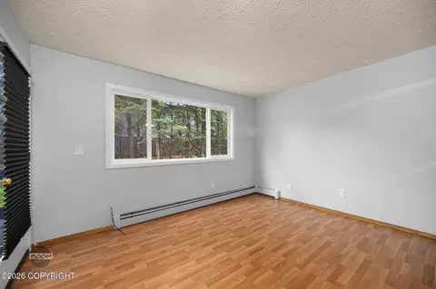 Living - 5018 E 43rd Ave # 2, Anchorage, AK 99508 photo 3 of 6