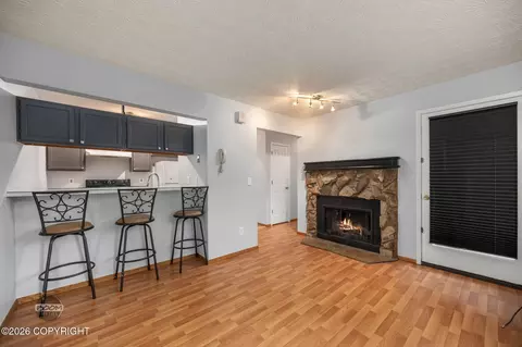 Living - 5018 E 43rd Ave # 2, Anchorage, AK 99508 photo 1 of 6