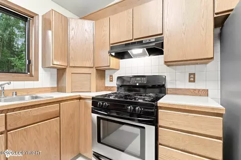 Kitchen - 21910 Sheltering Spruce Loop, Chugiak, AK 99567 photo 4 of 4