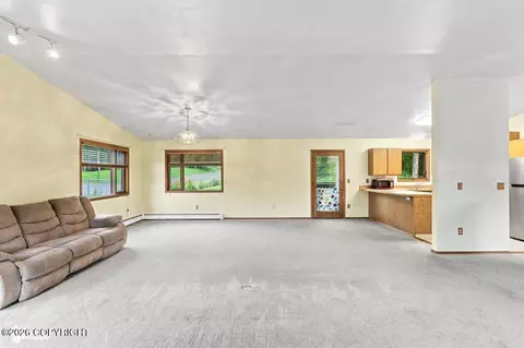 Living - 21910 Sheltering Spruce Loop, Chugiak, AK 99567 photo 2 of 6