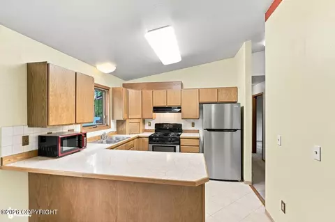 Kitchen - 21910 Sheltering Spruce Loop, Chugiak, AK 99567 photo 1 of 4