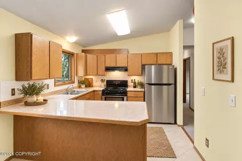 Kitchen - 21910 Sheltering Spruce Loop, Chugiak, AK 99567 photo 1 of 3