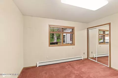 Bedroom - 21910 Sheltering Spruce Loop, Chugiak, AK 99567 photo 2 of 5