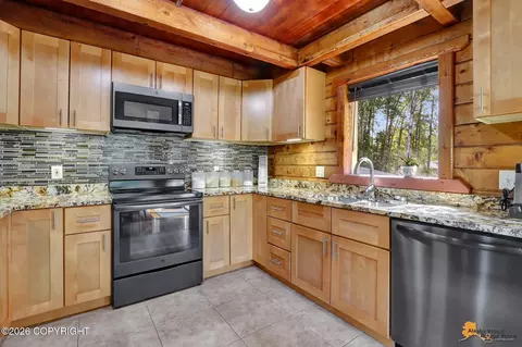 Kitchen - 17340 Monte Rd, Eagle River, AK 99577 photo 2 of 5