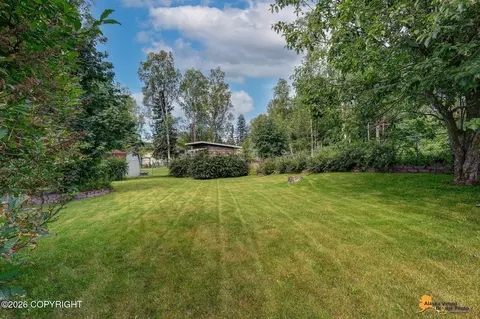 Exterior - 7657 E 20th Ave, Anchorage, AK 99504 photo 11 of 16