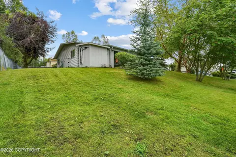 Exterior - 4907 E 43rd Ave, Anchorage, AK 99508 photo 7 of 8