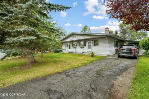 Exterior - 4907 E 43rd Ave, Anchorage, AK 99508 photo 3 of 8