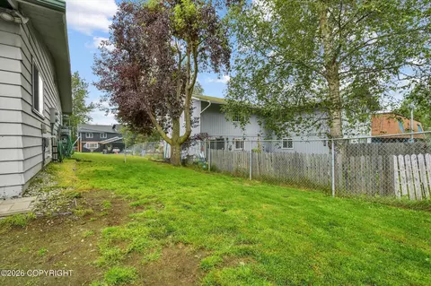 Exterior - 4907 E 43rd Ave, Anchorage, AK 99508 photo 6 of 8