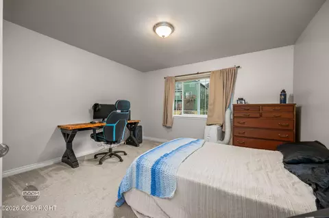 Bedroom - 20832 Icefall Dr, Eagle River, AK 99577 photo 8 of 13