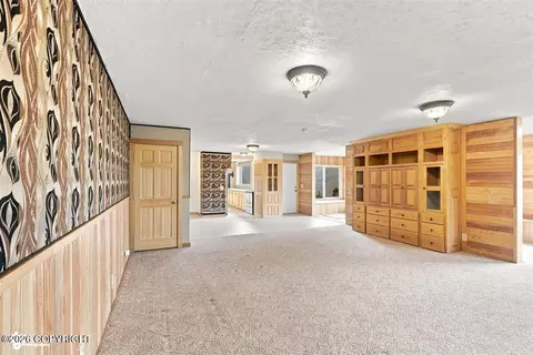 Living - 32545 Eagle Vista Dr, Eagle River, AK 99577 photo 2 of 6