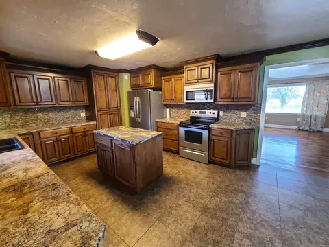 Kitchen - 480 E Bruce St, Piggott, AR 72454 photo 3 of 8