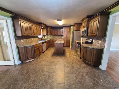 Kitchen - 480 E Bruce St, Piggott, AR 72454 photo 1 of 8