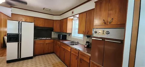 Kitchen - 719 Luzerne St, Mount Ida, AR 71957 photo 7 of 7