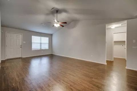 Living - 7001 Woodsgate Cv, Alexander, AR 72002 photo 4 of 5