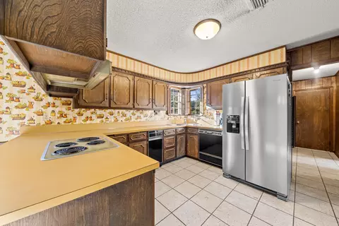 Kitchen - 115 Heritage Pl, De Queen, AR 71832 photo 3 of 5