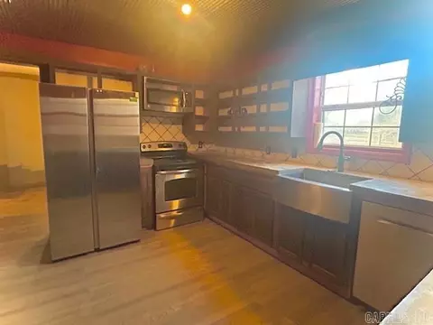 Kitchen - 1673 Red River Rd, Fox, AR 72051 photo 2 of 3