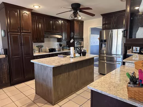 Kitchen - 1242 St Augustine Blvd, Trumann, AR 72472 photo 2 of 3