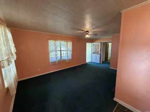 Living - 675 E Jackson St, Piggott, AR 72454 photo 1 of 6