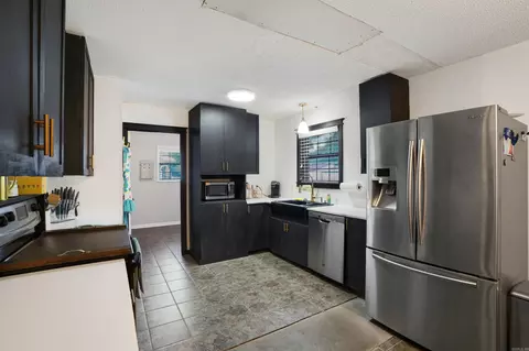 Kitchen - 680 E German Ln, Conway, AR 72032 photo 2 of 2