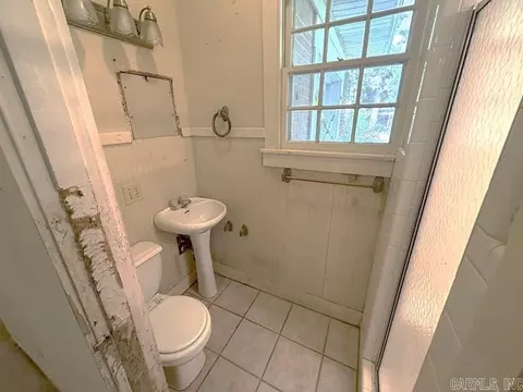Bath - 400 E Nichols St, England, AR 72046 photo 1 of 3