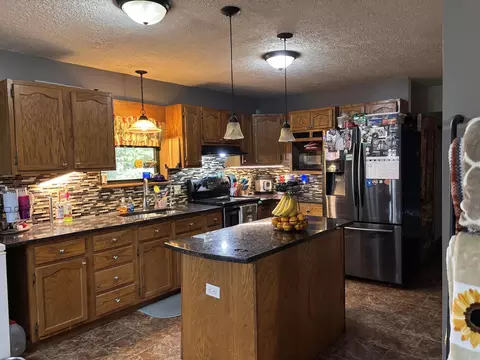 Kitchen - 404 Cook Rd, Mountain View, AR 72560 photo 2 of 3