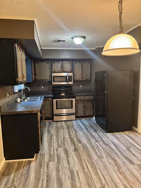 Kitchen - 1300 Charles St, Trumann, AR 72472 photo 2 of 2