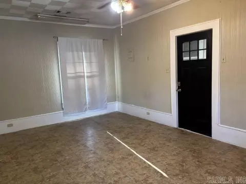Living - 100 E 13th St, Smackover, AR 71762 photo 2 of 3
