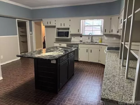 Kitchen - 100 E 13th St, Smackover, AR 71762 photo 1 of 3