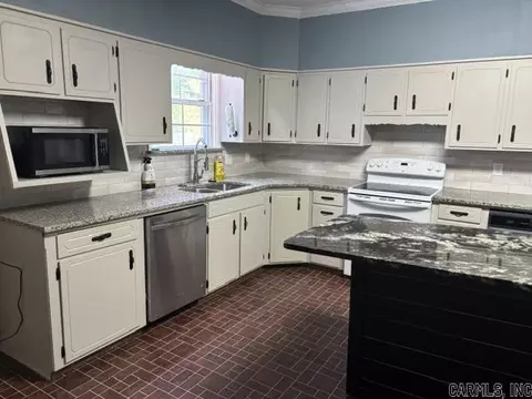 Kitchen - 100 E 13th St, Smackover, AR 71762 photo 3 of 3