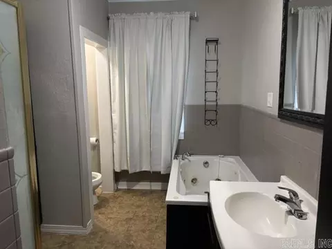 Bath - 100 E 13th St, Smackover, AR 71762 photo 1 of 8