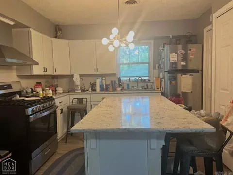 Kitchen - 165 Poplar St, Piggott, AR 72454 photo 2 of 2