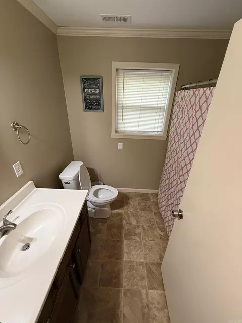 Bath - 105 E Moore St, Tuckerman, AR 72473 photo 1 of 2