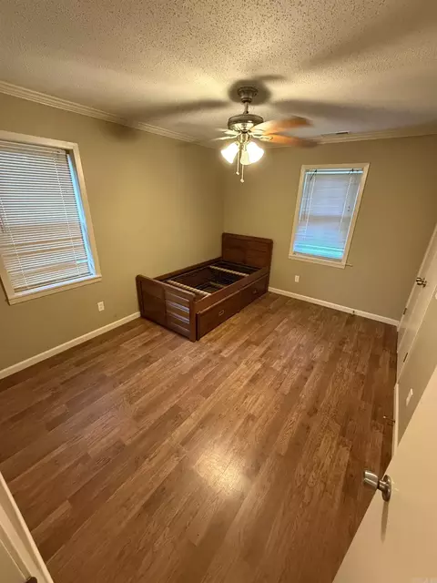 Bedroom - 105 E Moore St, Tuckerman, AR 72473 photo 3 of 3