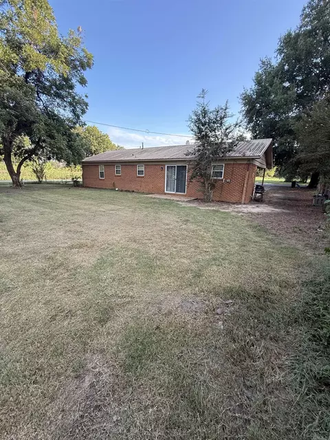 Exterior - 105 E Moore St, Tuckerman, AR 72473 photo 3 of 5