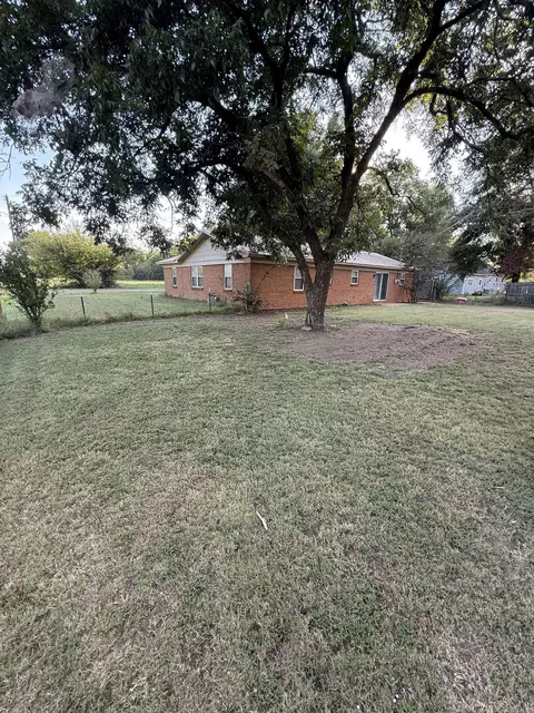 Exterior - 105 E Moore St, Tuckerman, AR 72473 photo 4 of 5