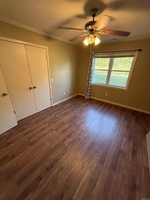 Bedroom - 105 E Moore St, Tuckerman, AR 72473 photo 2 of 3