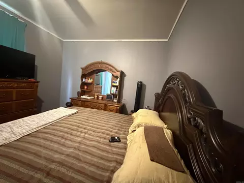 Bedroom - 404 E Johnson Ave, Osceola, AR 72370 photo 4 of 5