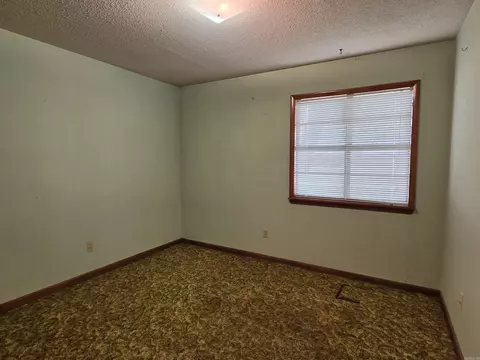 Bedroom - 1708 N Highway 33, Augusta, AR 72006 photo 2 of 3