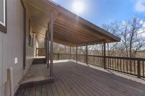Exterior - 211 E Forsythe St, Pyatt, AR 72672 photo 2 of 6