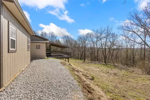Exterior - 211 E Forsythe St, Pyatt, AR 72672 photo 5 of 6