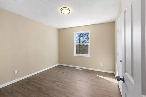 Bedroom - 211 E Forsythe St, Pyatt, AR 72672 photo 1 of 4