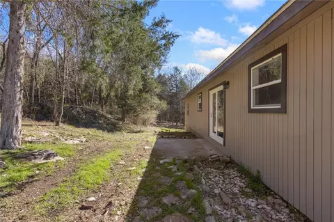 Exterior - 211 E Forsythe St, Pyatt, AR 72672 photo 4 of 6
