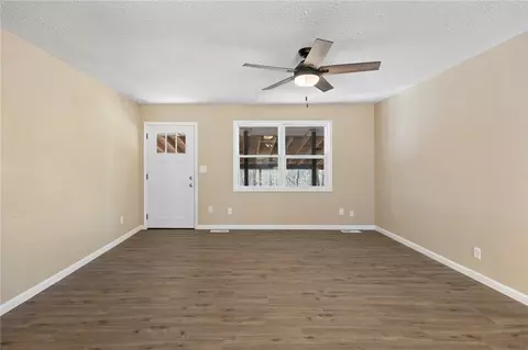 Living - 211 E Forsythe St, Pyatt, AR 72672 photo 1 of 3