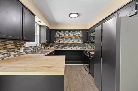 Kitchen - 211 E Forsythe St, Pyatt, AR 72672 photo 1 of 4