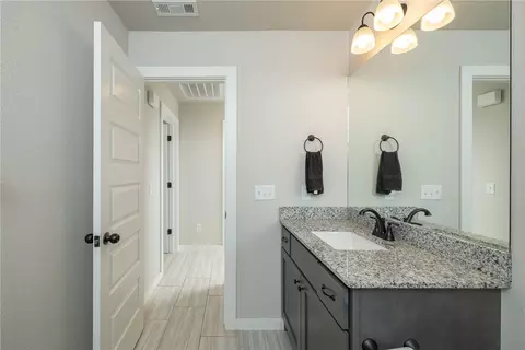 Bath - 718 Diamond Ave, Lowell, AR 72745 photo 2 of 3