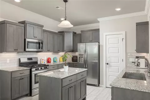 Kitchen - 718 Diamond Ave, Lowell, AR 72745 photo 2 of 3